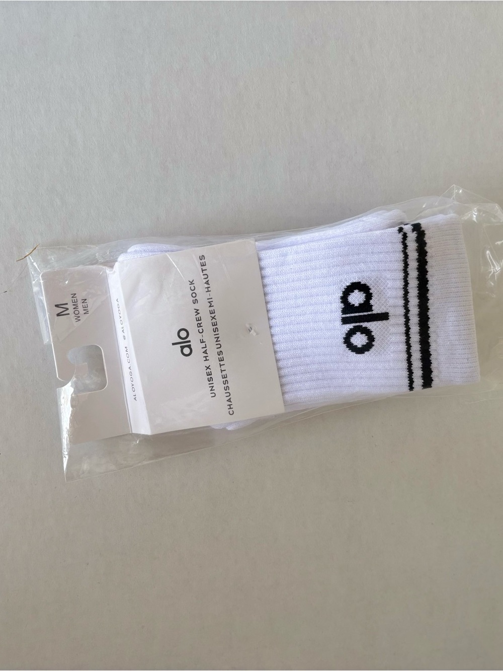 ALO Yoga White Athletic Crew Socks with Black Logo and Stripes